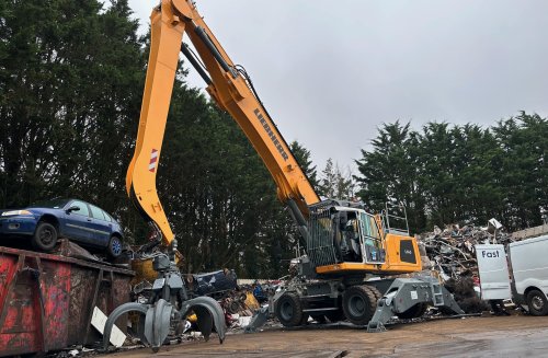 Liebherr LH40 material handler at the TMR scrap yard in Guildford, Surrey.